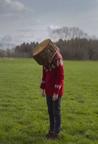 Man standing on grassy field