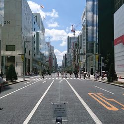 City street against cloudy sky