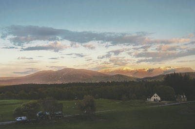 Scenic view of landscape against sky during sunset