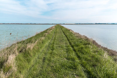 Scenic view of land against sky