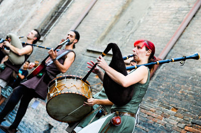 Group of people playing guitar