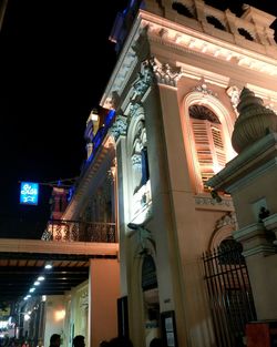 Low angle view of illuminated statue at night