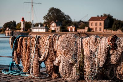 Stack of fishing net against building