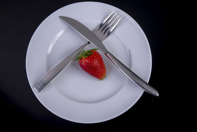 Directly above shot of strawberries in plate