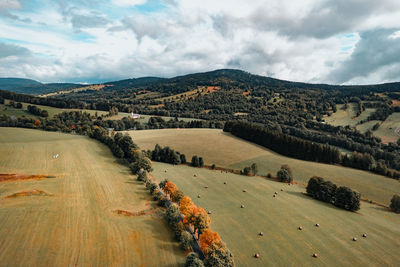 Autumn landscape with church and hills