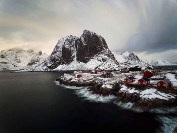 Snowcapped mountains against sky during winter