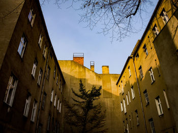 Low angle view of residential buildings against clear sky