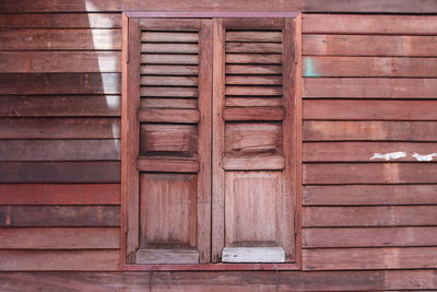 Full frame shot of wooden log cabin