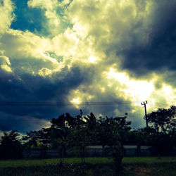 Scenic view of landscape against cloudy sky