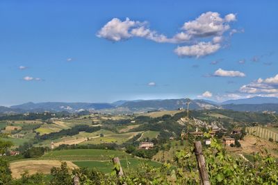 Scenic view of town against sky