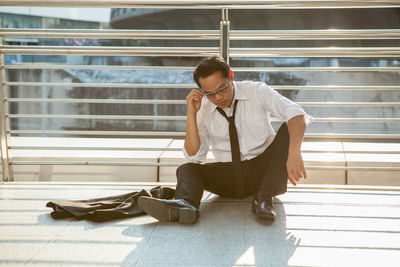 Young man using mobile phone