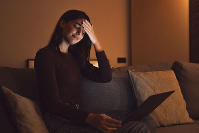 Young woman using mobile phone