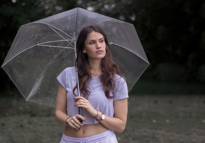 Portrait of woman with umbrella