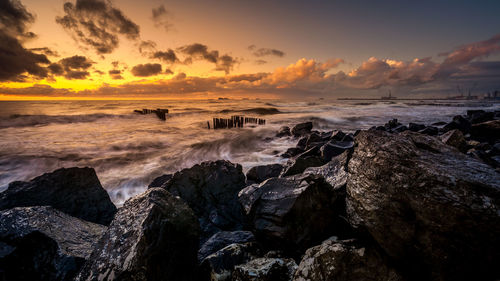 Scenic view of sea against sky during sunset