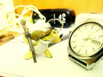 Close-up of clock on wall