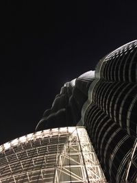 Low angle view of office building against sky