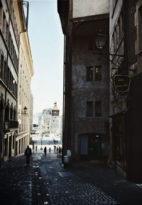 People walking on street in city