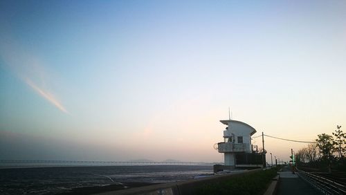 Scenic view of sea against clear sky during sunset