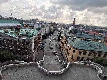 High angle view of street amidst buildings in city