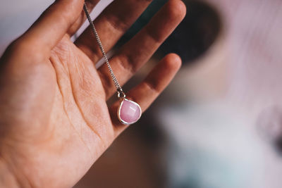 Midsection of woman holding hands