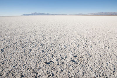 Scenic view of desert against clear sky