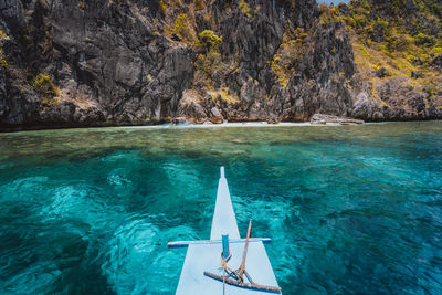 Scenic view of sea against rock formation