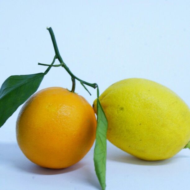 food and drink, fruit, freshness, healthy eating, food, yellow, orange - fruit, close-up, citrus fruit, still life, ripe, lemon, studio shot, organic, white background, juicy, apple, stem, no people, green color