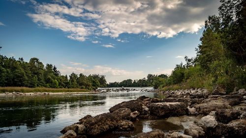 Scenic view of river against sky