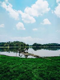 Scenic view of lake against sky