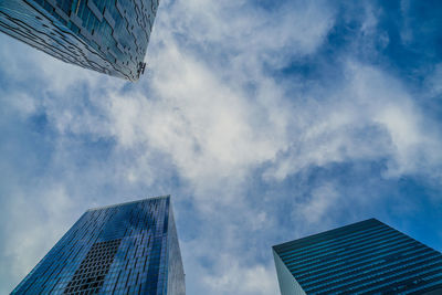 Low angle view of skyscraper against sky