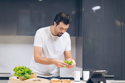 Young man preparing food