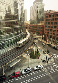 High angle view of street amidst buildings in city