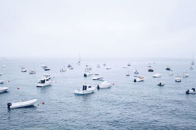 View of boats moving in sea