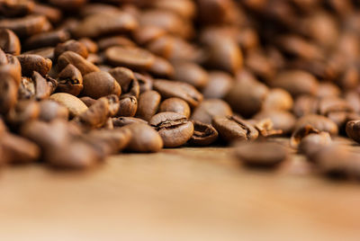 Close-up of coffee beans on table