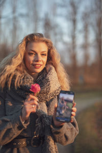 Young woman using mobile phone