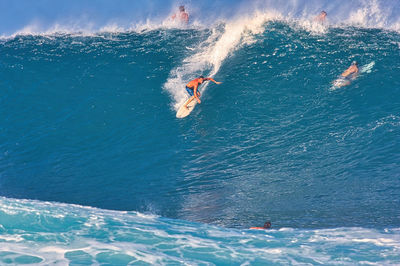 High angle view of people on sea