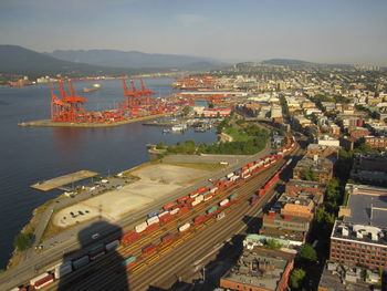 Aerial view of commercial dock at harbor in city