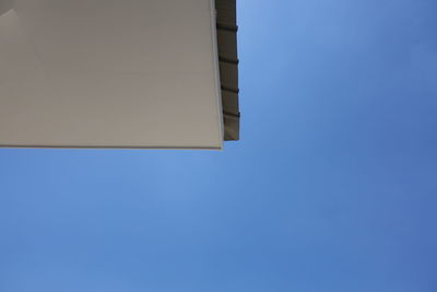 Low angle view of building against blue sky