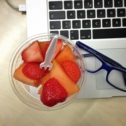 High angle view of strawberries on table