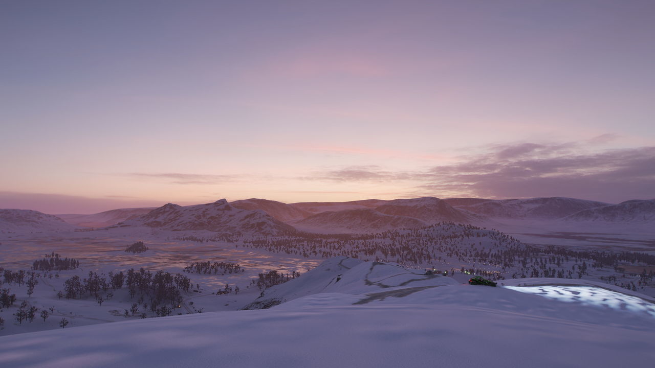 SCENIC VIEW OF SNOWCAPPED MOUNTAINS AGAINST SKY DURING WINTER