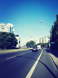 Buildings against clear blue sky