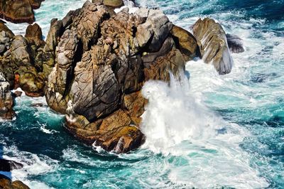 Scenic view of rocks in sea