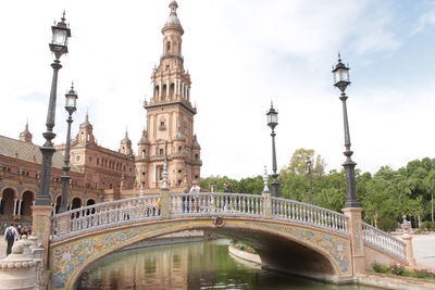 Arch bridge over canal in city