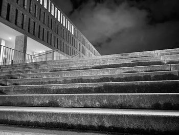 Low angle view of staircase by building against sky