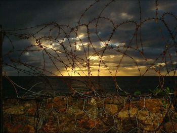 Scenic view of cloudy sky at sunset