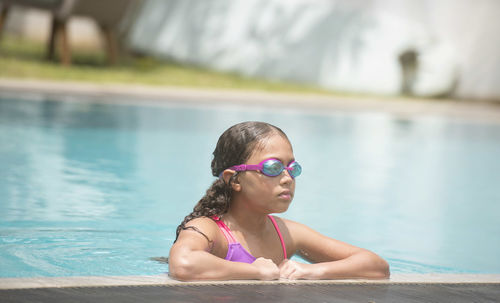 Portrait of boy in swimming pool