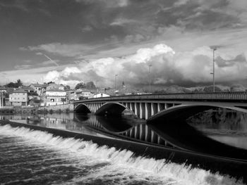 Black and white image of the bridge in chabanais that crosses la vienne river in france