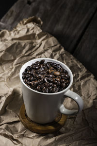High angle view of coffee cup on table