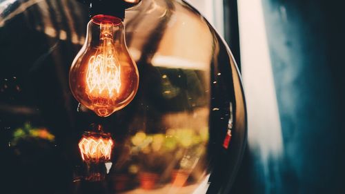 Close-up of illuminated light bulb
