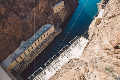 High angle view of buildings amidst rocky mountains at hoover dam